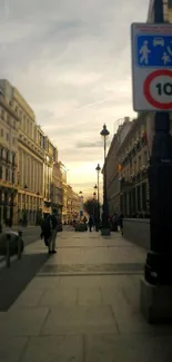 Urban street scene with sunset skies and architectural buildings.