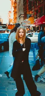 Urban street style portrait in bustling city background.