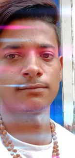 Young man poses in front of a jewelry store, showcasing urban style.