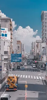 Urban street view with skyscrapers and blue sky.