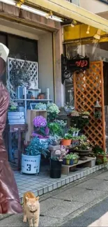 Urban street with flowers and potted plants.