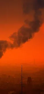 Sunset over city skyline with smoke trail in an orange-red sky.