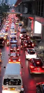 Vibrant urban traffic jam with red lights at night.