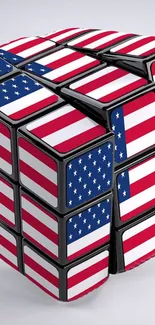 Rubik's Cube with American flag pattern on a smooth surface.