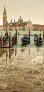 Venetian gondolas docked by the Grand Canal in a rainy setting, ideal for mobile wallpaper.