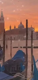 Venetian sunset with gondolas on tranquil water.