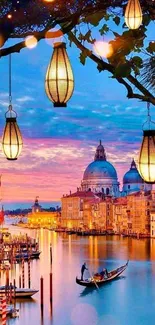 Venice canal at sunset with glowing lanterns.