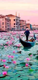 Gondola gliding through a Venice canal with flowers and sunset in the background.