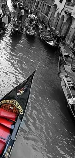 Venice canal with gondolas featuring striking red seats.