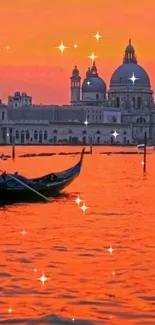 Gondola on Venice water during sunset with orange hues in the sky.