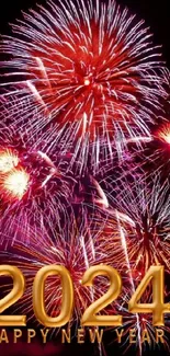 2024 fireworks wallpaper with happy new year text and vibrant colors.