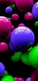 Colorful 3D bubbles on a dark background wallpaper.