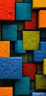 Vibrant 3D geometric blocks wallpaper with orange, blue, and green colors.