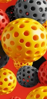 Colorful 3D geometric spheres with vibrant red, yellow, and black hues.