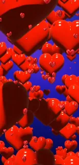 Vibrant 3D red hearts with blue backdrop.