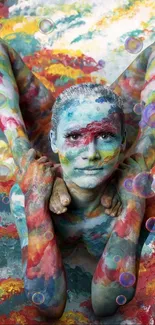 Vibrant abstract body art in colorful paint on a flexible figure.