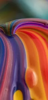 Vibrant abstract wallpaper with swirling colors.