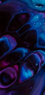 Vibrant abstract liquid wallpaper in blue and purple tones.