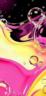 Vibrant abstract wallpaper with pink, yellow, and black liquid bubbles.