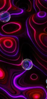 Abstract red and purple fluid patterns with bubbles on dark background.