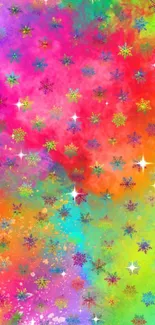 Vibrant abstract wallpaper with colorful snowflakes on a gradient background.