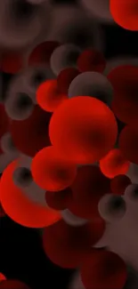 Abstract wallpaper with vibrant red circles on black backdrop.