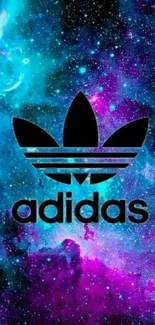 Adidas logo on vibrant galaxy wallpaper.