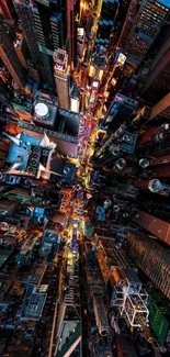 A vibrant aerial shot of a cityscape at night, showcasing dynamic urban life.