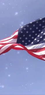 A vibrant American flag against a starry sky background.