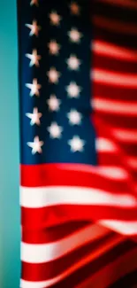 Blurred vibrant American flag with bold red, white, and blue stripes.