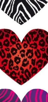 Three hearts with animal prints: zebra, leopard, and tiger stripes.