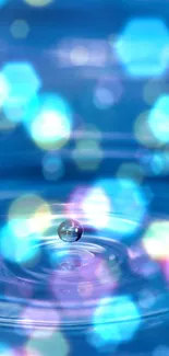 Aqua ripple with glowing bokeh and water droplet.