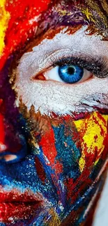 Vibrant face with colorful paint streaks and a striking blue eye.