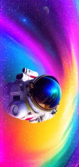 Colorful astronaut floats in vibrant space cosmos wallpaper.