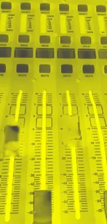 Vibrant yellow audio mixer with sliders, perfect for music enthusiasts.