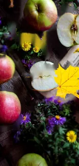 Mobile wallpaper with apples, flowers, and fall leaves.