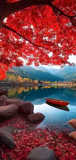 Red autumn leaves over a tranquil lake with a boat.
