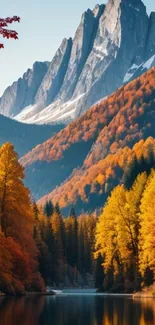 Vibrant autumn mountain landscape with colorful trees and serene reflection.