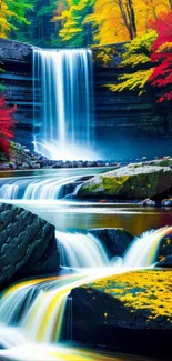 Vibrant autumn waterfall with colorful foliage.