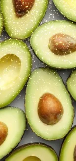 Vibrant avocado slices forming a seamless pattern on a wallpaper background.