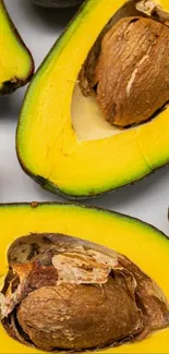 Close-up of vibrant avocado slices with seeds.