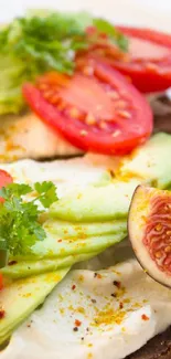 Colorful avocado toast with figs and tomatoes on white background.