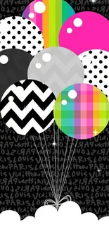 Colorful geometric and polka dot balloons on a black background.