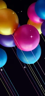 Colorful balloons float in night sky.