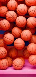 Vibrant array of basketballs in orange and red tones.