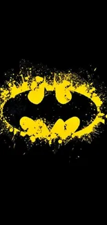 Batman logo with yellow splash on black background.