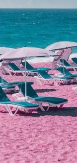 Vibrant beach scene with pink sand and turquoise waters under umbrellas.