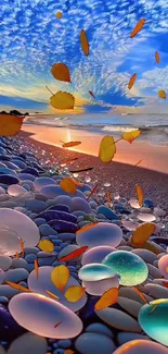 Colorful pebbles and autumn leaves at sunset on a serene beach.