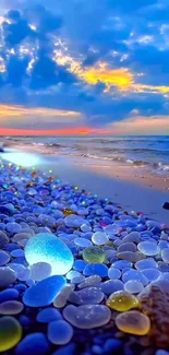 Colorful beach pebbles with vibrant sunset sky.