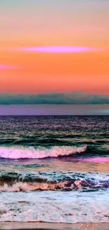 Vibrant beach sunset with ocean waves under a turquoise and orange sky.